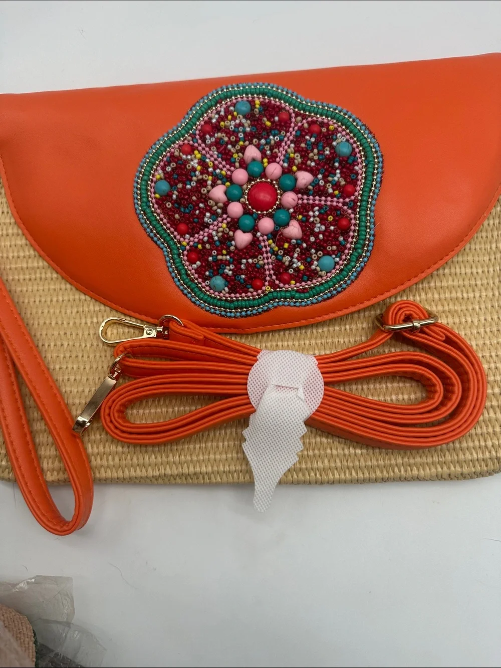 Handcrafted Orange Straw Clutch with Beaded Floral Accent
